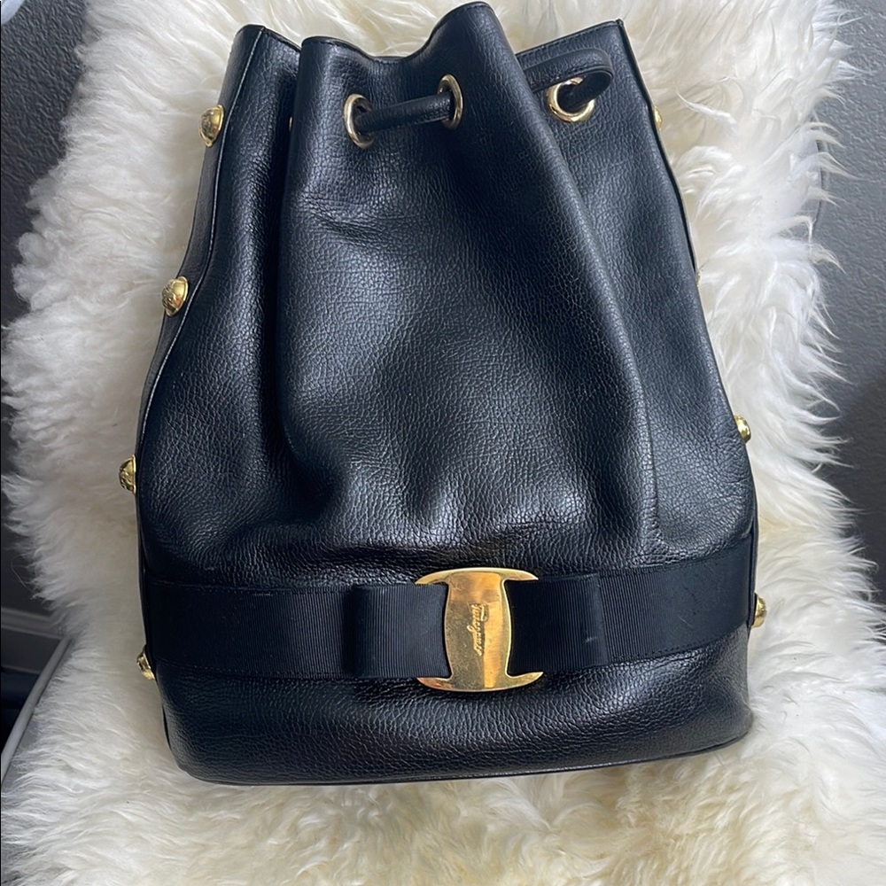 Salvatore Ferragamo Black and Gold Hobo Bag with Drawstring Closure